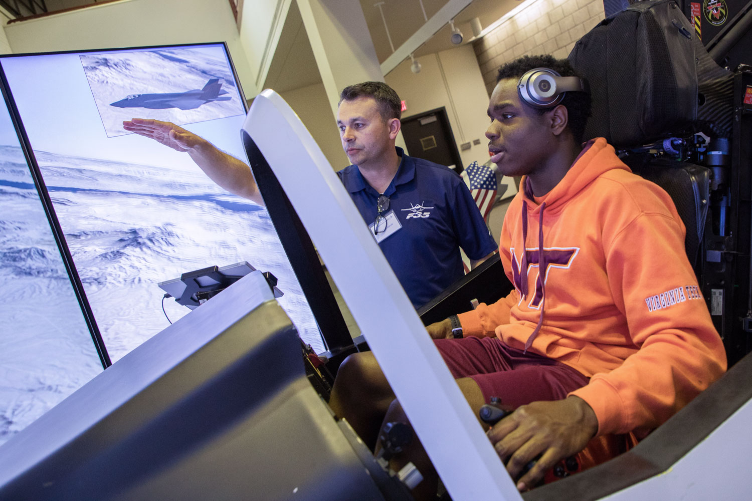 Virginia Tech student on a Lockheed Martin flight simulator.
